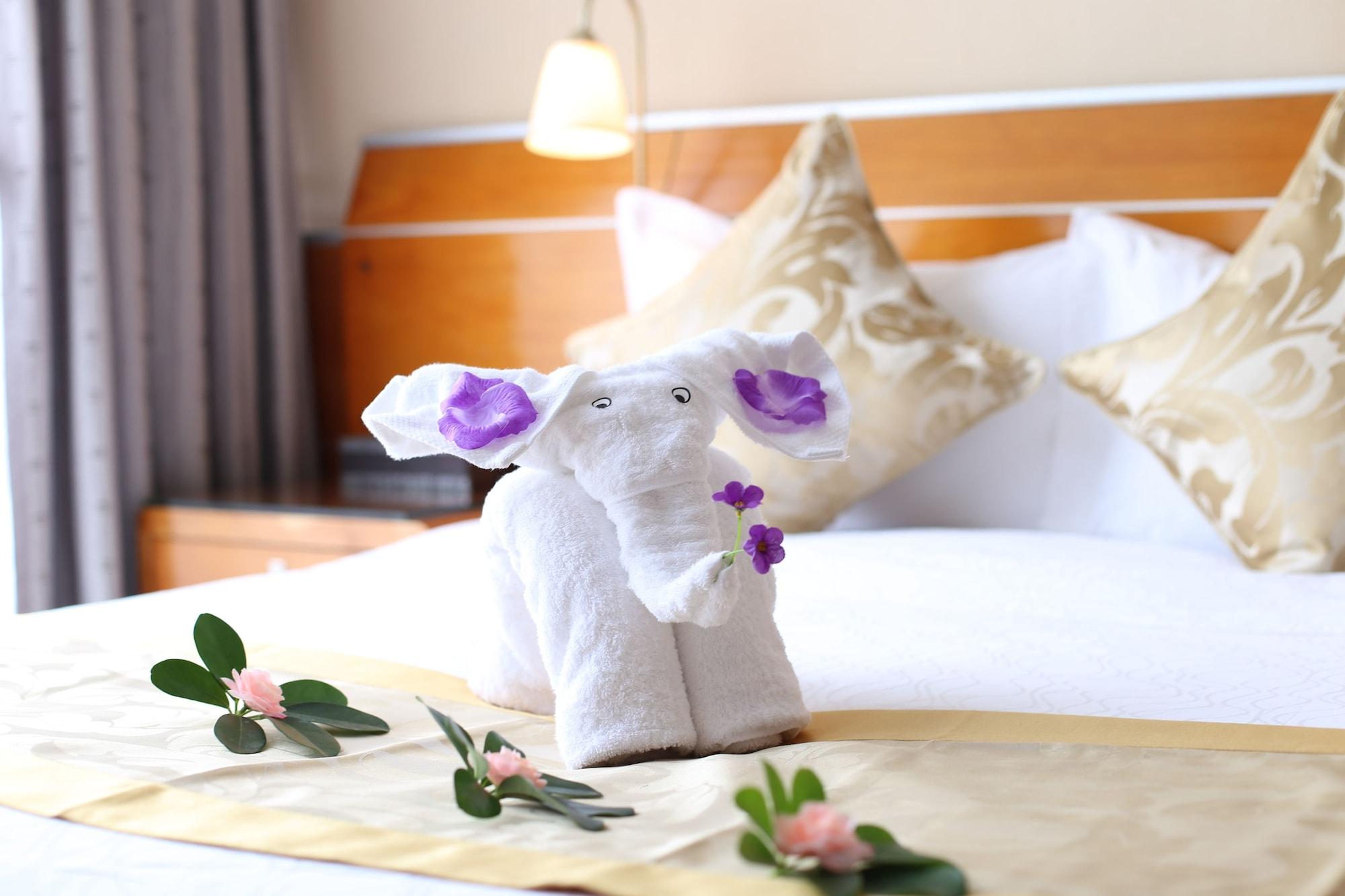 גואנגג'ואו Yihe Hotel Ouzhuang מראה חיצוני תמונה